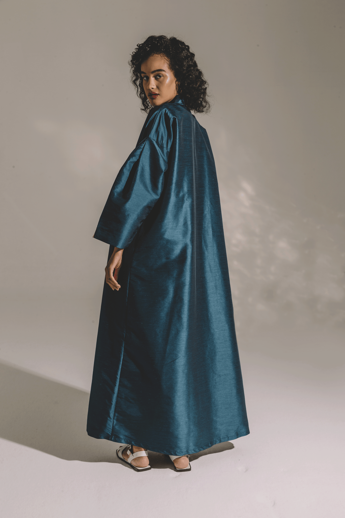 TEAL PLEATED SLEEVE IN COAT STYLE